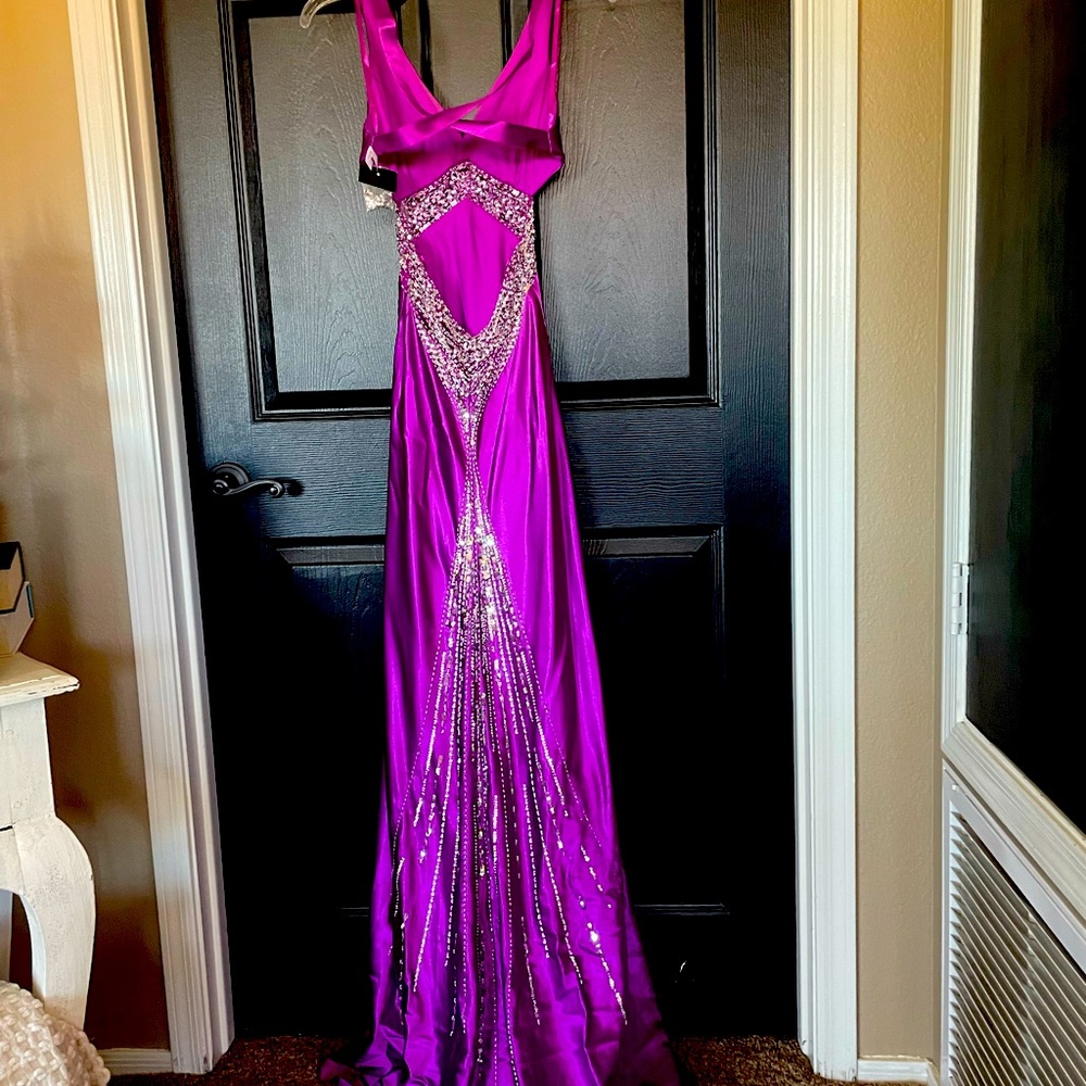 Beautiful purple prom dress. Worn one time.